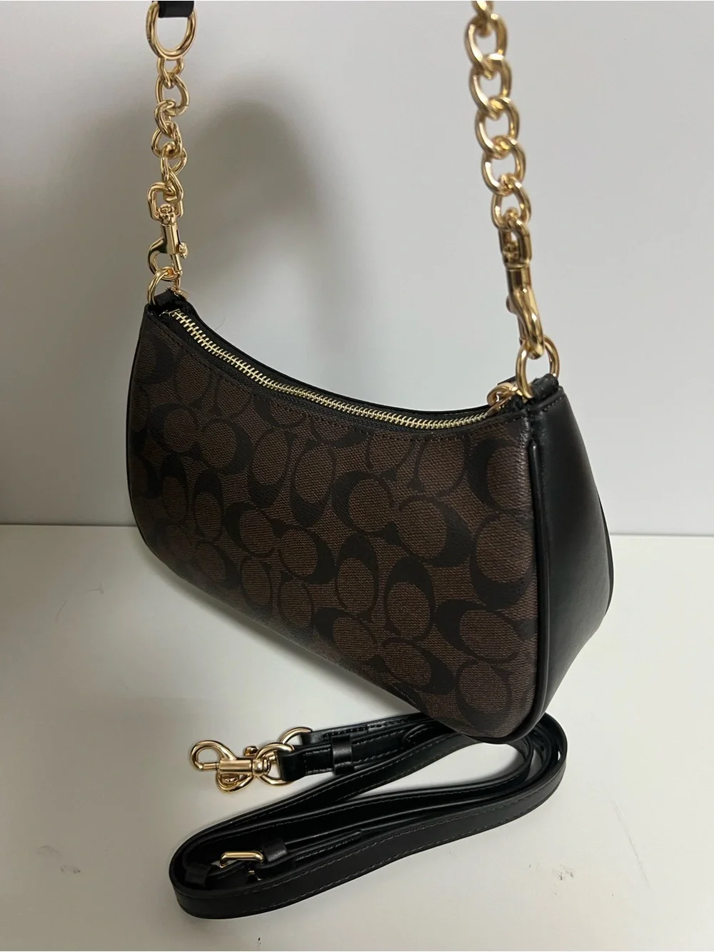 Coach Brown Signature Canvas Shoulder Bag with Black Trim and Gold Hardware